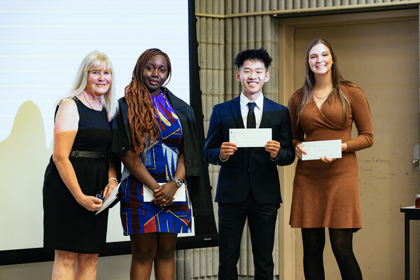 Dr. Cathy Evans Jessica Otoo-Appiah, James Ma, and Stephanie Chauvin standing together.