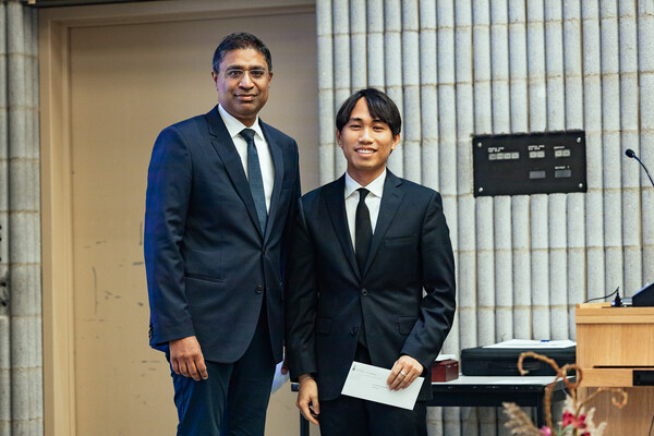 Richard Varkey and Christian Martin standing together.