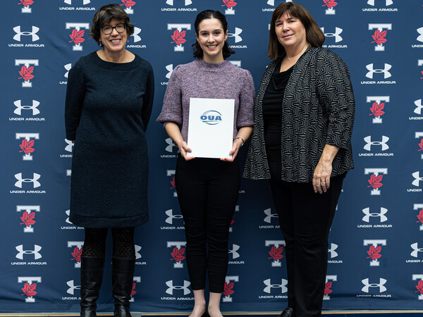Emma Jianopoulos poses with award with Sandy Welsh and Beth Ali